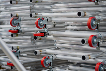 Aluminium scaffold tower caster wheels in red color at scaffolding tower warehouse