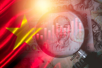 Double exposure among of Dong banknotes with stock market graph chat and Vietnam flag for Vietnam country is new born economy and high business development growth from many investment concept.
