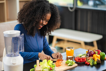 Fit woman enjoys healthy fruit breakfast after yoga training. fitness, nutrition, home lifestyle.