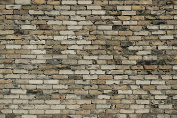 yellow and white brick wall close up