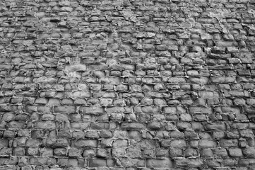 gray background, photo of gray brick wall close-up