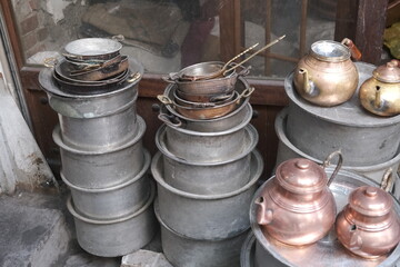Old copper items in a bazaar in Diyarbakir
