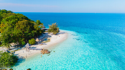 Discover the tranquil beauty of Koh Munnork Island in Rayong, Thailand under a clear blue sky