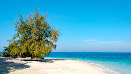 Discover tranquility on Koh Munnork Island in Rayong, Thailand with pristine beaches and blue skies