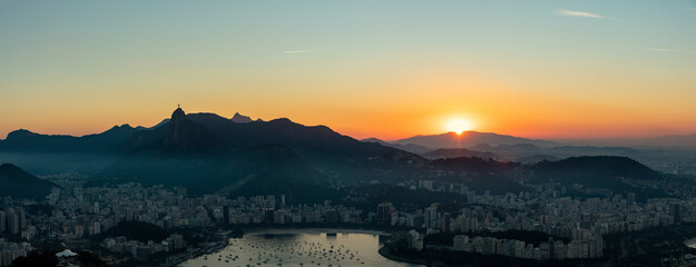 View of Guanabara Bay and the city of Rio de Janeiro, Brazil at sunset.
