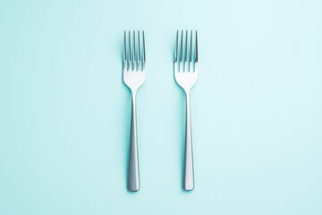 Fork mock up set against a clean light blue background showcasing sleek design and quality
