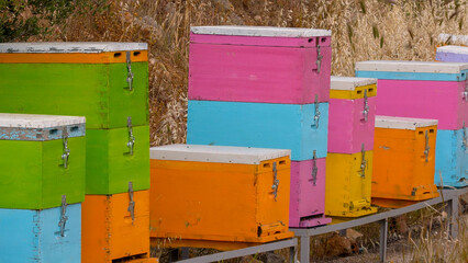 Row of colorful beehives in Greece.