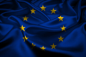European Union flag waving in the wind. Close up of Europe banner blowing, soft and smooth silk....