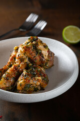 Chicken legs fried with garlic and parsley