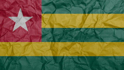 Togo flag on crumpled paper background, paper texture