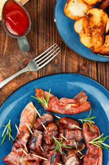 Dates in bacon.