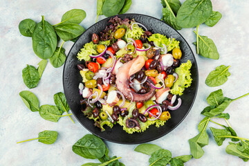 Mediterranean salad with grilled octopus.