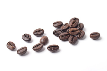 Many roasted coffee beans isolated on white background, top view