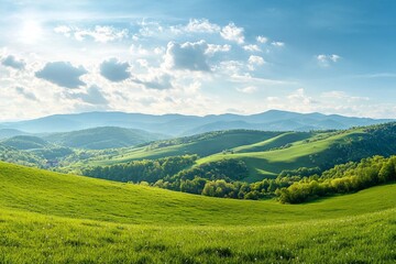 Fototapeta premium panorama of beautiful countryside of romania. sunny afternoon. wonderful springtime landscape in mountains. grassy field and rolling hills. rural scenery