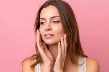 Fototapeta premium Portrait caucasian woman isolated on pink background . Portrait
