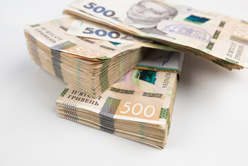 on a white background a pack of hryvnias. Financial concept. Ukrainian money. 500 hryvnias on a white background.