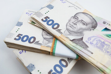 on a white background a pack of hryvnias. Financial concept. Ukrainian money. 500 hryvnias on a white background.