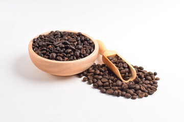 Coffee beans in wooden bowl isolated on white background