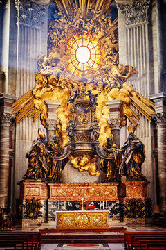 VATICAN CITY, VATICAN - OCTOBER 29: Masterpieces of Bernini; Chair of St. Peter and Gloria, the descent of the Holy Spirit in apse of basilica of St. Peter's in Rome, Italy on October 29, 2014