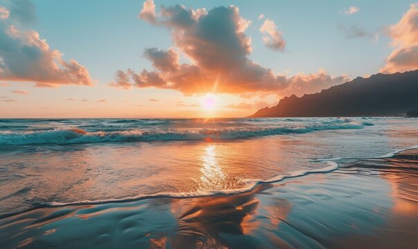 Serene beach at sunset with calm waves, reflecting colorful clouds and mountains in the distance, creating a tranquil and picturesque scene.