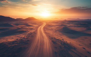 A desert road with a sun in the sky