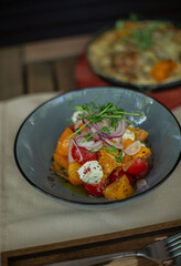 platter of salad on a restaurant table