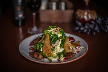 pear and beef liver salad on the restaurant table