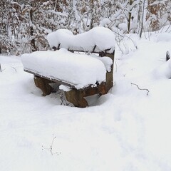 snow covered bench