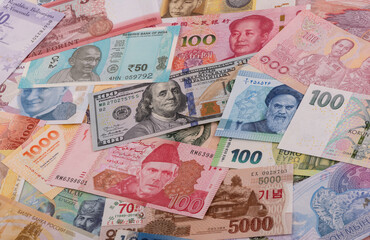 Many banknotes from different countries of the world of different denominations