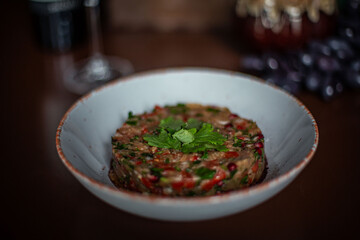 Georgian cuisine. Salad on the restaurant's prepared table
