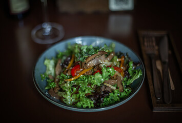 platter of salad on a restaurant table