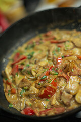 a hot skillet dish on a restaurant table