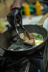 steak cooking in the restaurant kitchen