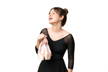 Young girl practicing ballet over isolated chroma key background laughing