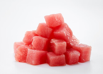 Close up of tuna cubes ingredient isolated on white background
