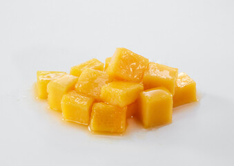 Close up of mango pieces isolated on white background