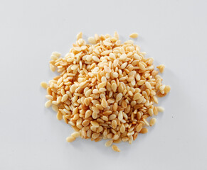 Close up of oat grains isolated on white background