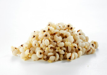 Closeup of Job's tears kernels isolated on white background