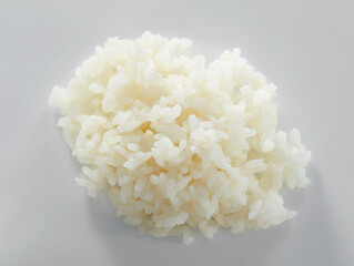 Close up of white rice isolated on white background