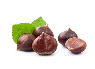 Ripe chestnuts with leaves