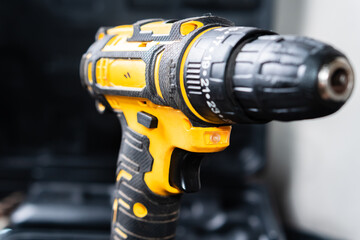 Close-up of a Yellow and Black Cordless Drill