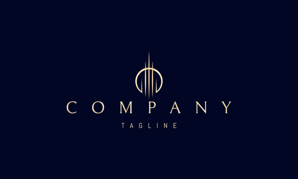 Vector golden logo with an abstract image of a tall tower against the backdrop of the sun.