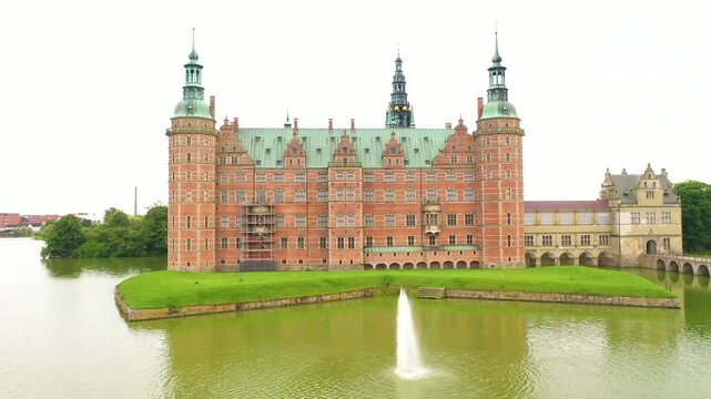 Frederiksborg castle in Denmark -  Drone fly back shot