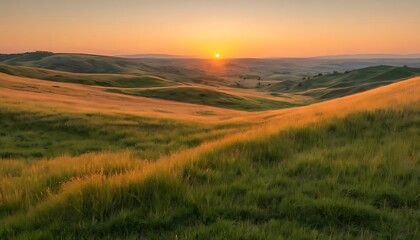 Obraz premium Warm Sunset Lighting Up a Serene Rolling Hillside
