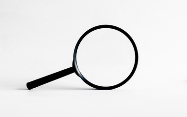 Horizontal magnifying glass on white background. Accessories, general convenience, education, learning enhancement.