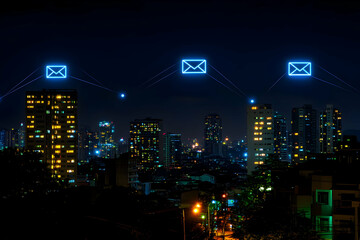 Night cityscape with glowing email icons connecting buildings.