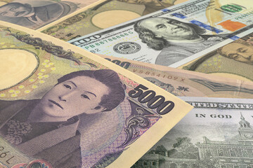 Japanese Yen and US Dollar Banknotes. Cash. Financial Concept.
