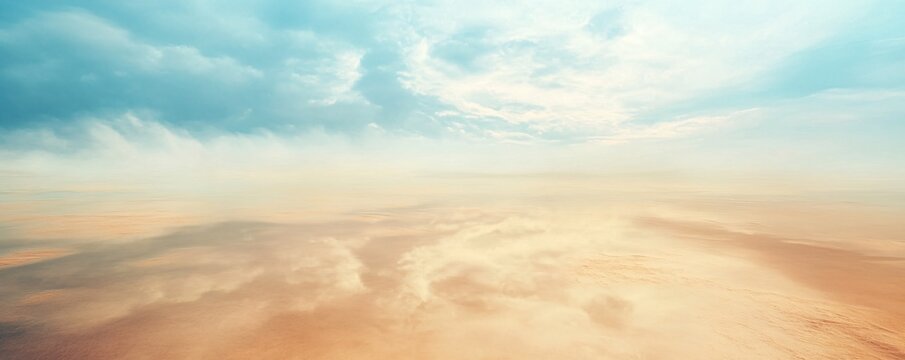 Sandstorm rolling over desert under cloudy sky