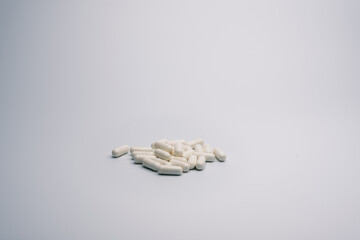 White Capsules on Clean Background