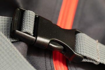 Semi-automatic fastener for connecting fabric tapes, slings, belts. Element of a backpack, bag....
